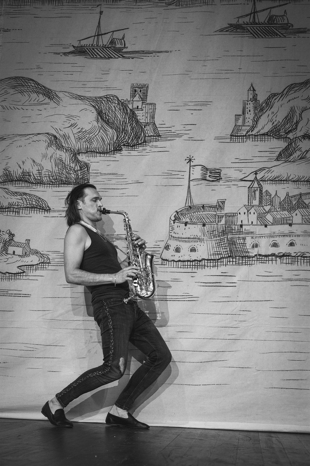 Mateo playing alto saxophone with SaxMax